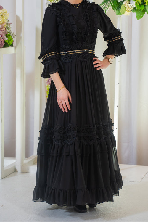 Elegant black tiered gown for teen