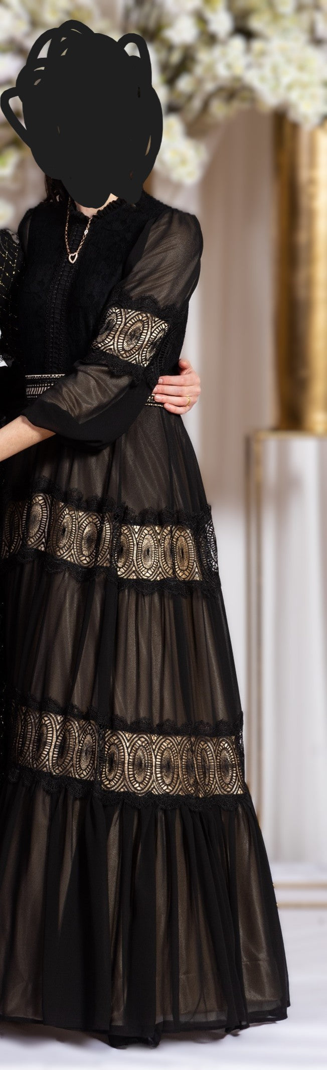 Gold trimmed black tiered maxi gown