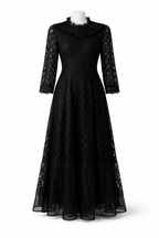 Nice black gown worn out of town